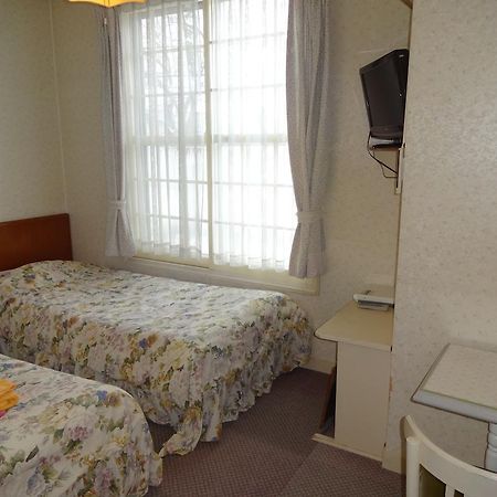Ishiuchi Pension Bruges Minamiuonuma Quarto foto