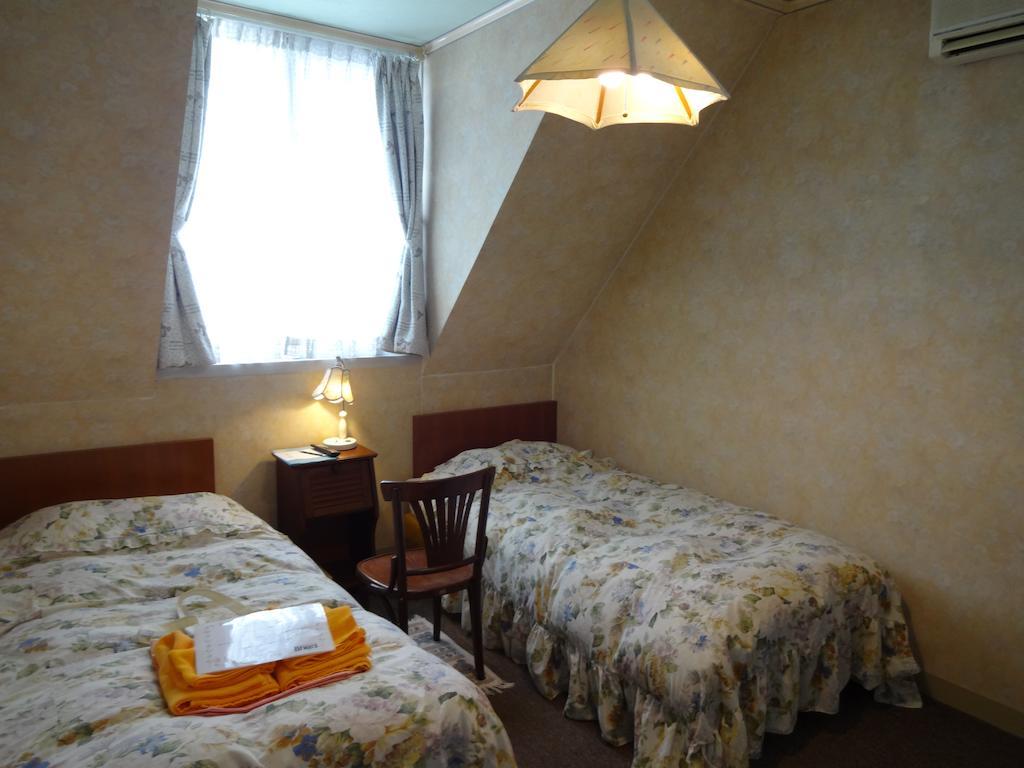 Ishiuchi Pension Bruges Minamiuonuma Quarto foto