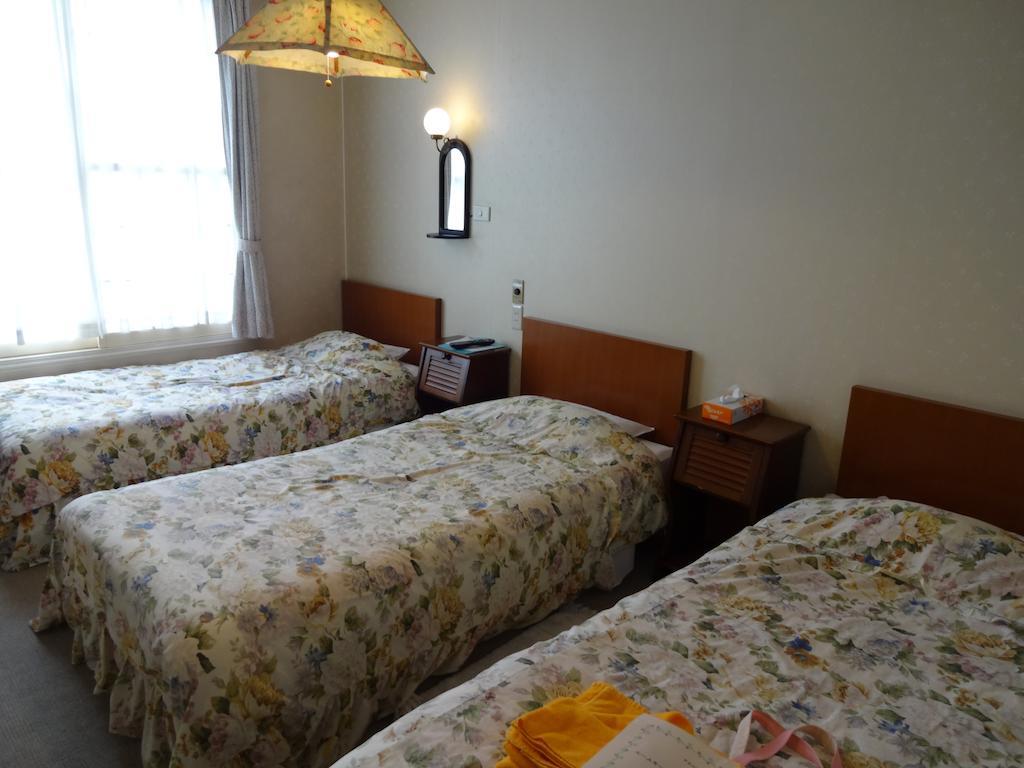 Ishiuchi Pension Bruges Minamiuonuma Quarto foto